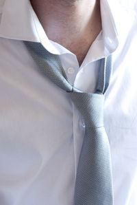 Midsection of man wearing hat