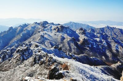 Scenic view of snowcapped mountains against sky