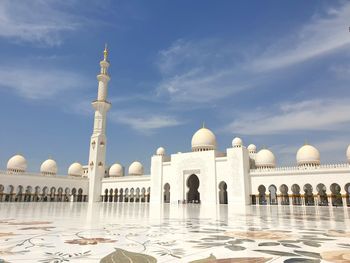 View of historic mosque building against sky