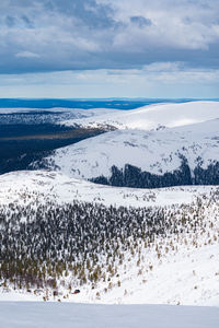 Scenic view of sea against sky during winter