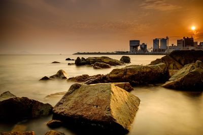 Scenic view of sea against sky during sunset