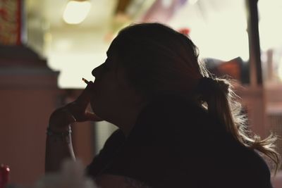 Close-up portrait of a young woman