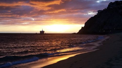 Scenic view of sea during sunset