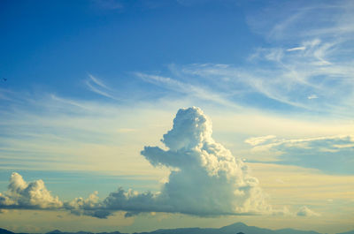 Scenic view of vapor trail against blue sky