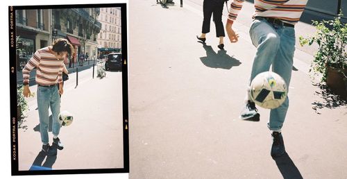 Low section of people walking on street