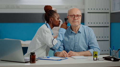 Doctor examining patient at hospital