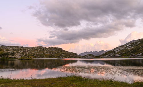 Scenic view of lake against sky during sunset