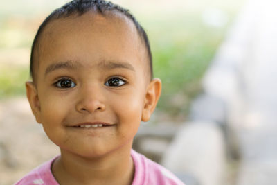 Portrait of cute boy smiling