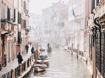 Panoramic view of canal passing through city