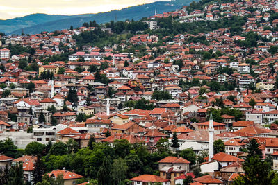 Aerial view of houses against sky