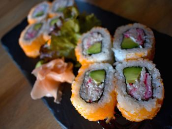 Close-up of sushi served on table