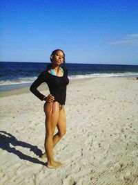 Woman standing on beach