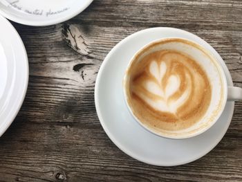 High angle view of cappuccino on table