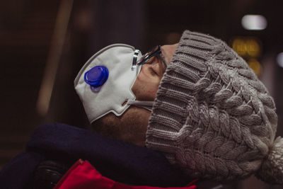 Portrait of man sleeping on floor