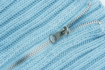 Close-up of sweater with zipper
