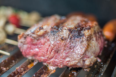 Close-up of meat on barbecue grill