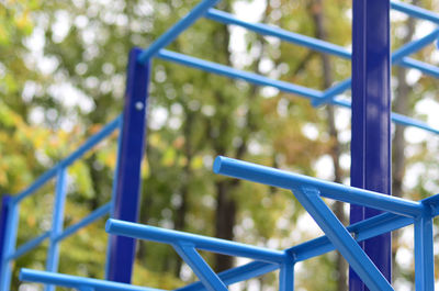 Blue outdoor play equipment in park