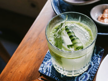 High angle view of drink in glass on table