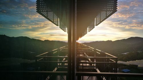 Bridge against sky during sunset