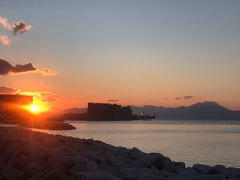 Scenic view of sea against sky during sunset