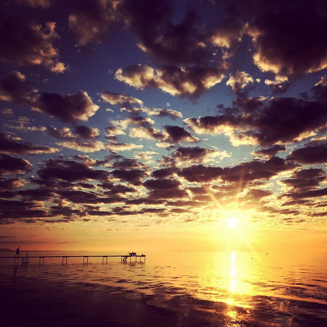 sunset, sea, beauty in nature, scenics, sky, nature, cloud - sky, tranquility, sun, tranquil scene, water, orange color, no people, outdoors, silhouette, sunlight, horizon over water, beach, day