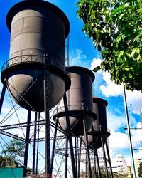 Low angle view of water tower against sky