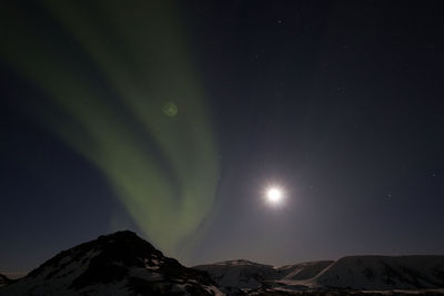 Low angle view of moon at night