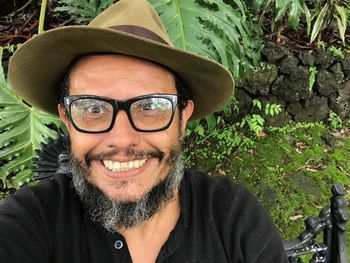 Portrait of smiling young man wearing hat