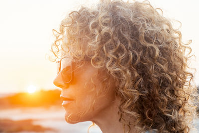 Close-up of woman with text against white background