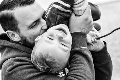 Portrait of friends with father and baby