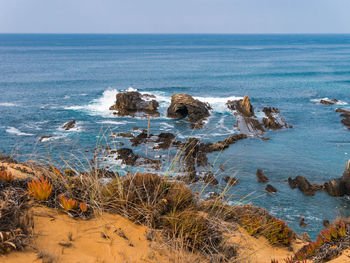 Scenic view of sea against clear sky