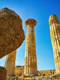 Low angle view of old ruin against clear sky