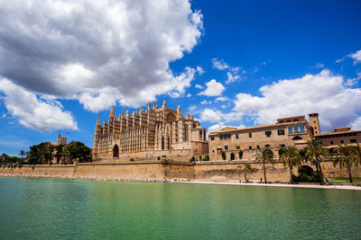 Historic building against cloudy sky