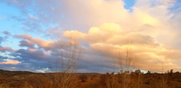 Panoramic view of landscape against sky during sunset