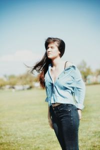 Young woman standing on ground