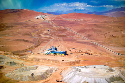 Aerial view of a long conveyor belt at copper mine in the altiplano of the atacama desert, chile.