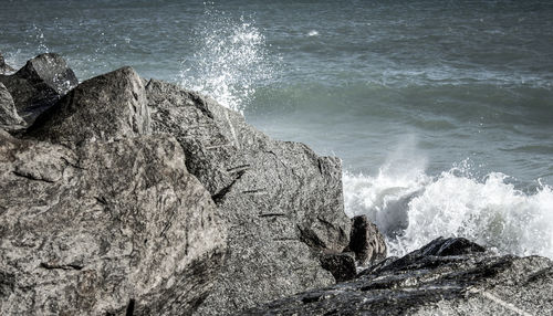 Waves splashing on rocks