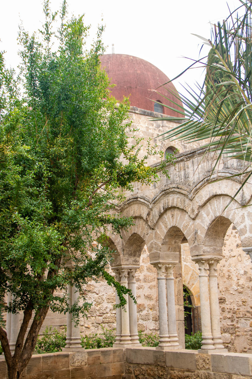 architecture, built structure, plant, tree, building exterior, history, the past, nature, arch, building, travel destinations, religion, no people, travel, place of worship, day, outdoors, belief, estate, tourism, garden, sky, courtyard, city, spirituality