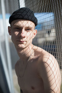 Portrait of young man wearing hat