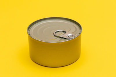 Close-up of dental equipment against yellow background