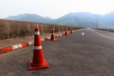 Orange traffic cone on the road