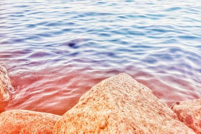 High angle view of surf on beach