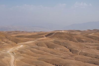 Scenic view of desert against sky