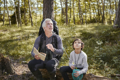 Father with son in forest