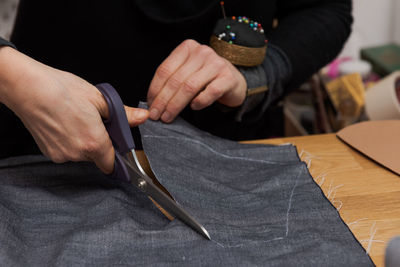 Close-up of man working on table