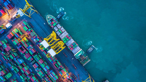 High angle view of container ship at commercial dock