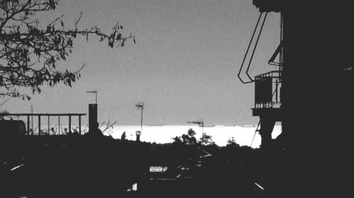 Built structure against clear sky at sunset