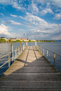 Pier over sea against sky