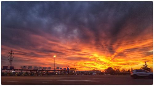 Dramatic sky over city during sunset