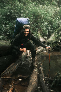 Portrait of man in forest